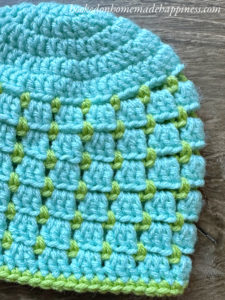 Block Stitch Beanie FREE Crochet Pattern - The Block Stitch Beanie Crochet Pattern uses a combination of basic stitches to create this neat, block-like look!